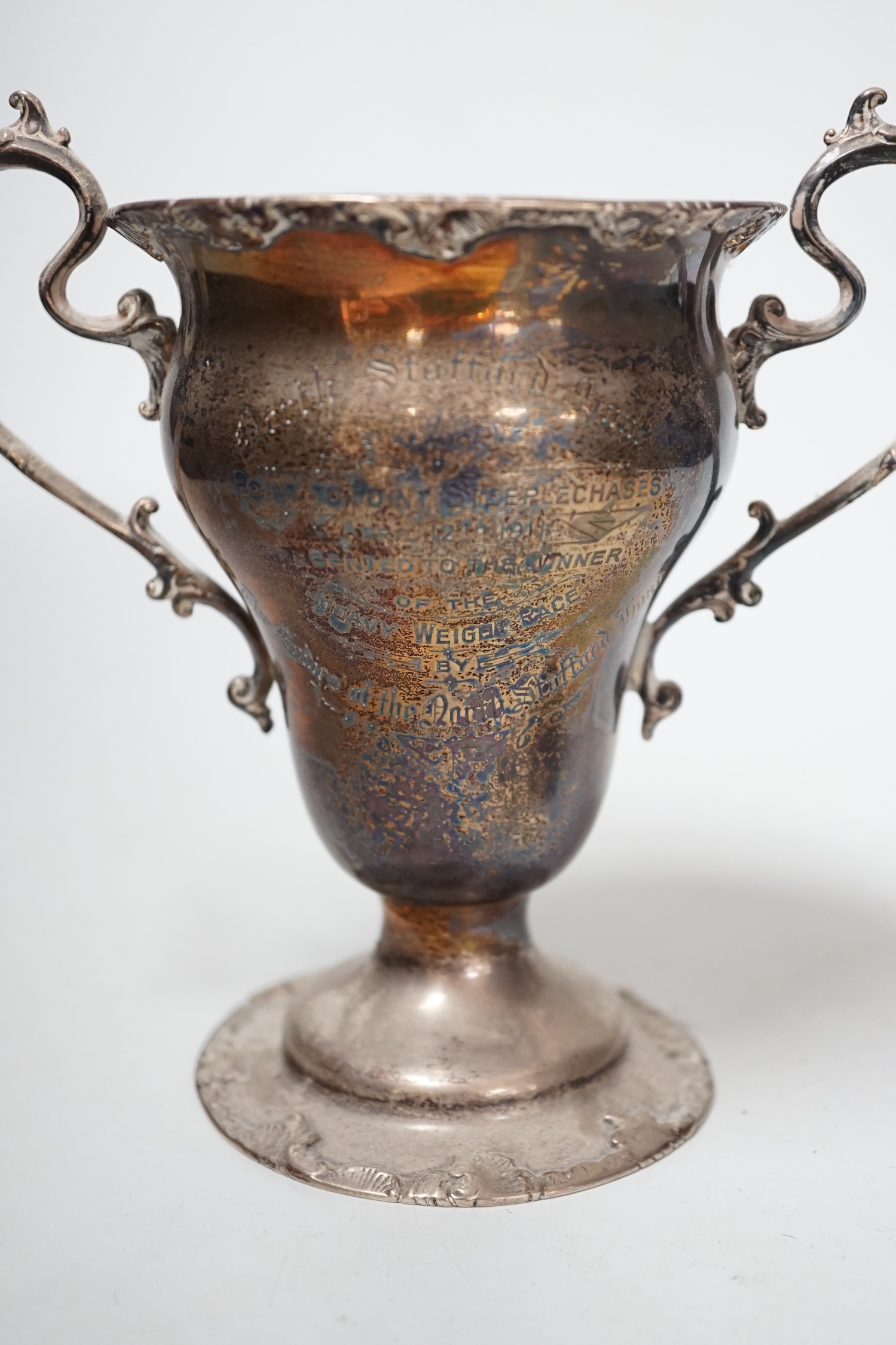 A George V silver two handled vase, Goldsmiths & Silversmiths Co Ltd, London, 1932, 16.2cm, 10oz and a spill vase.